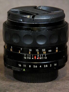 Auto Revuenon 55mm f/1.4 Tomioka Planar Lens M42